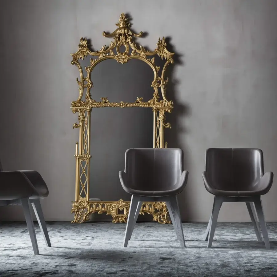 Elegant OAK Nota armchair upholstered in dark gray leather with tone-on-tone stitching and painted ash wood base