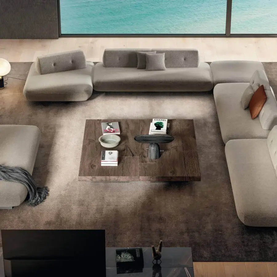 Elegant Lago Air coffee table in medium-toned brown wood is crafted with visible grain and supported by tempered glass legs