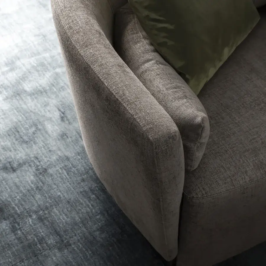 Superior OAK Melodia lounge chair upholstered in matte gray textile with dark green velvet lumbar cushion and painted metal feet