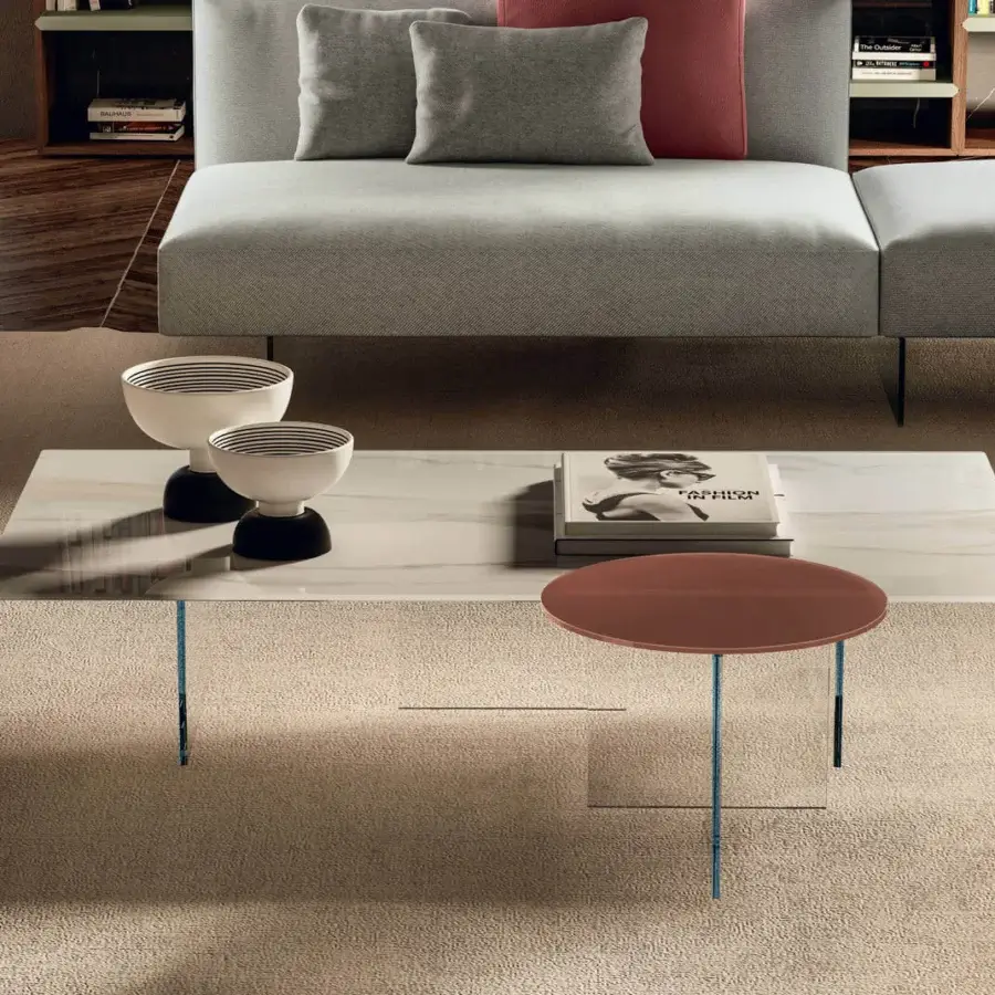 Elegant Lago Air coffee table with light marbled composite top and transparent tempered glass supports