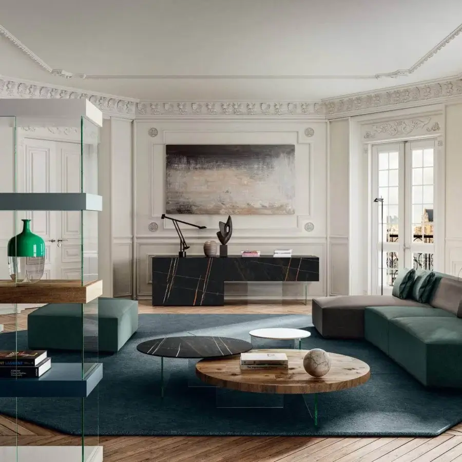 Distinguished Lago Air Round coffee table crafted in Italy with wood and green-finished metal legs with a smooth medium-brown finish