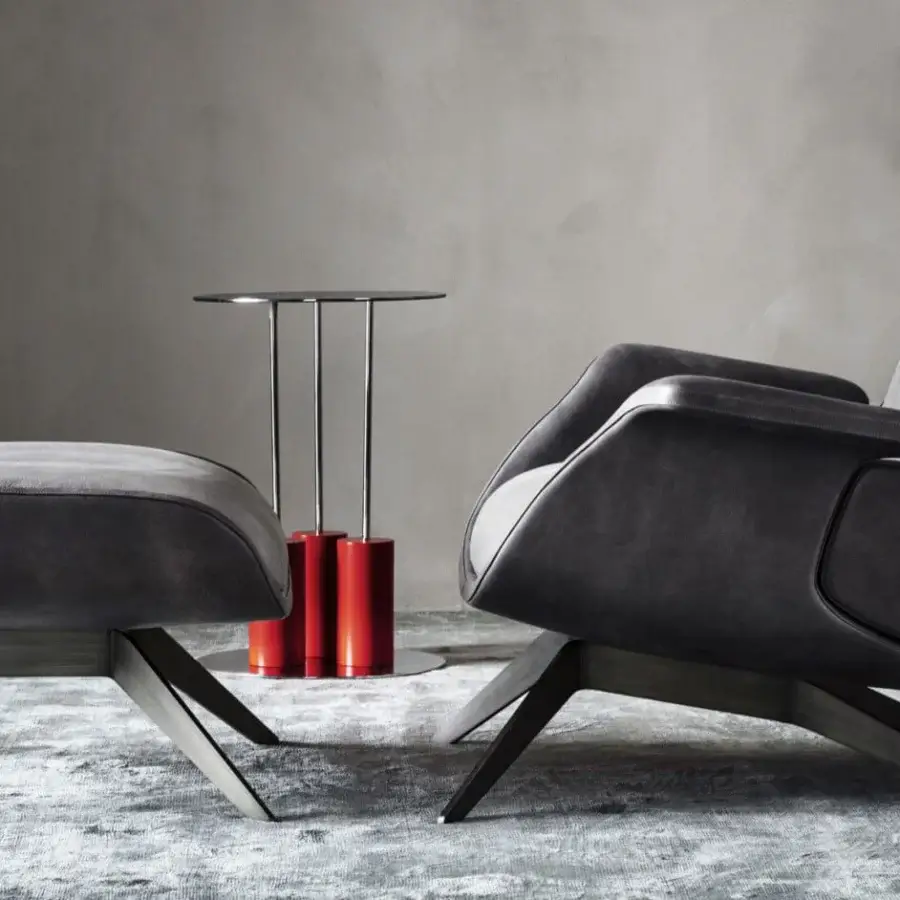 Exceptional OAK Blues lounge chair with dark gray leather upholstery, stylized armrests and angled wooden legs