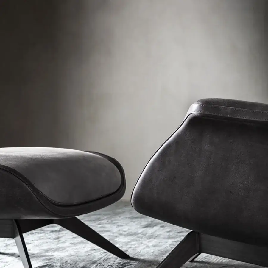 Superior OAK Blues lounge chair with supple leather upholstery, tone-on-tone stitching and sleek painted metal base