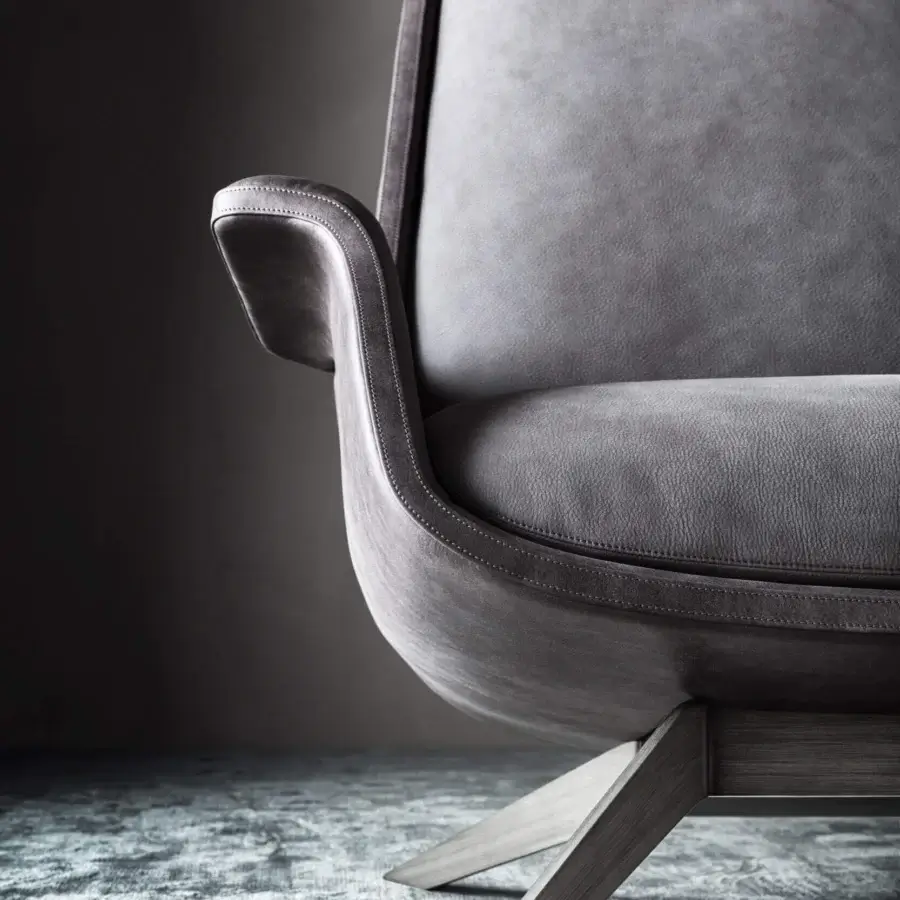 Distinguished OAK Blues lounge chair with medium-gray leather upholstery and painted gray metal base