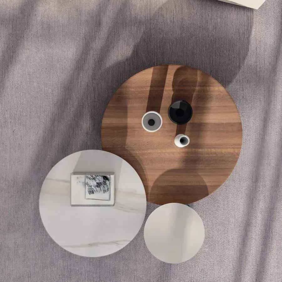 Distinguished Lago Air Round Coffee Table with warm brown wood surface and near-invisible tempered glass legs crafted with a matte finish