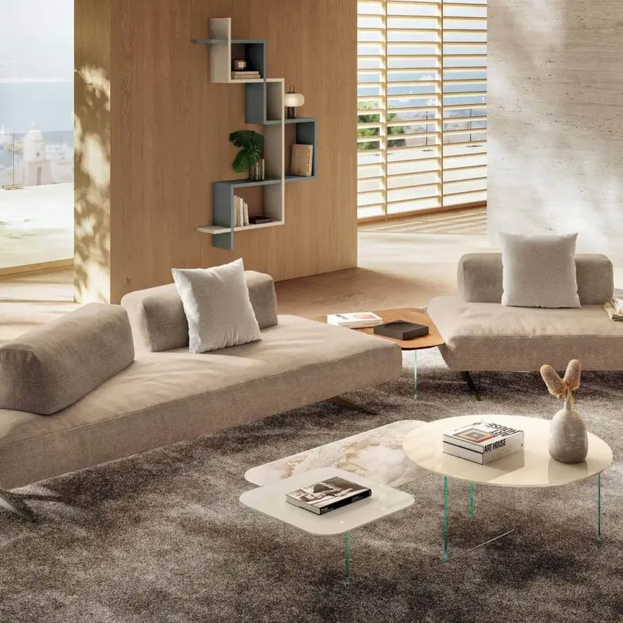 Distinguished Lago Air Round coffee table with creamy white matte tabletop and transparent tempered glass legs crafted in Italy