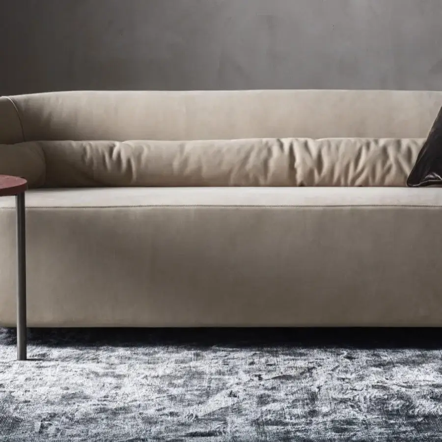 Exceptional OAK Melodia sofa with light beige fabric upholstery and curved silhouette built with sleek painted metal feet