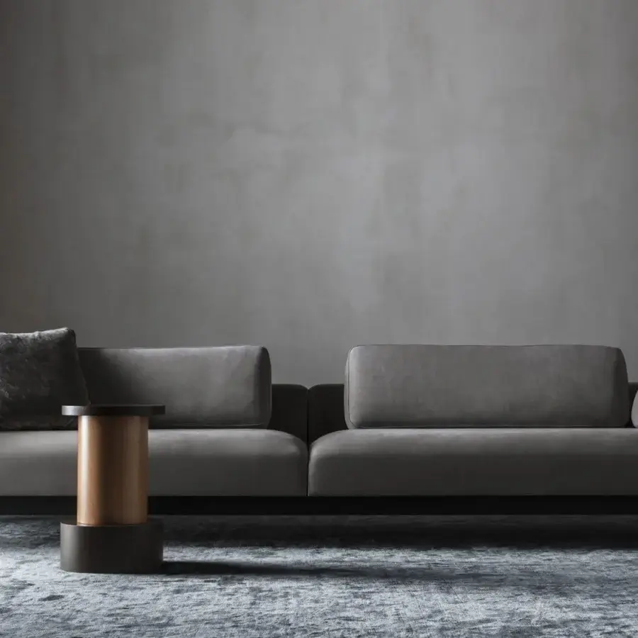 Distinguished OAK Opera sofa with fabric upholstery and dark toned metal legs exhibiting a low profile silhouette
