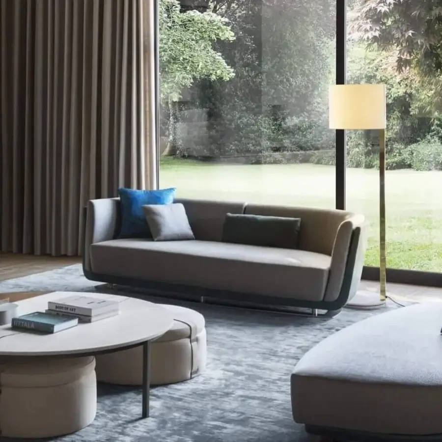 Distinguished OAK Solomon sofa with architectural curves upholstered in light gray textile and dark trim