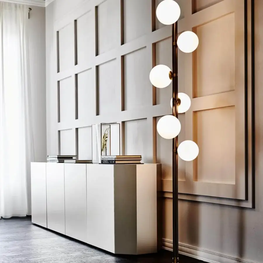 Distinguished Cattelan Italia Planeta floor lamp with burnished steel and brushed brass accents, showcasing satin white blown glass lampshades