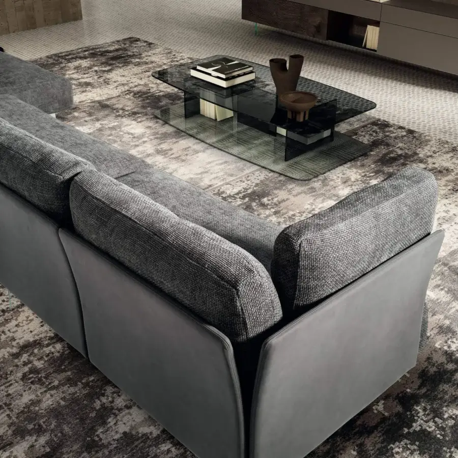 Architectural Lago Layers coffee table with transparent glass surfaces and glossy finish creating captivating reflections
