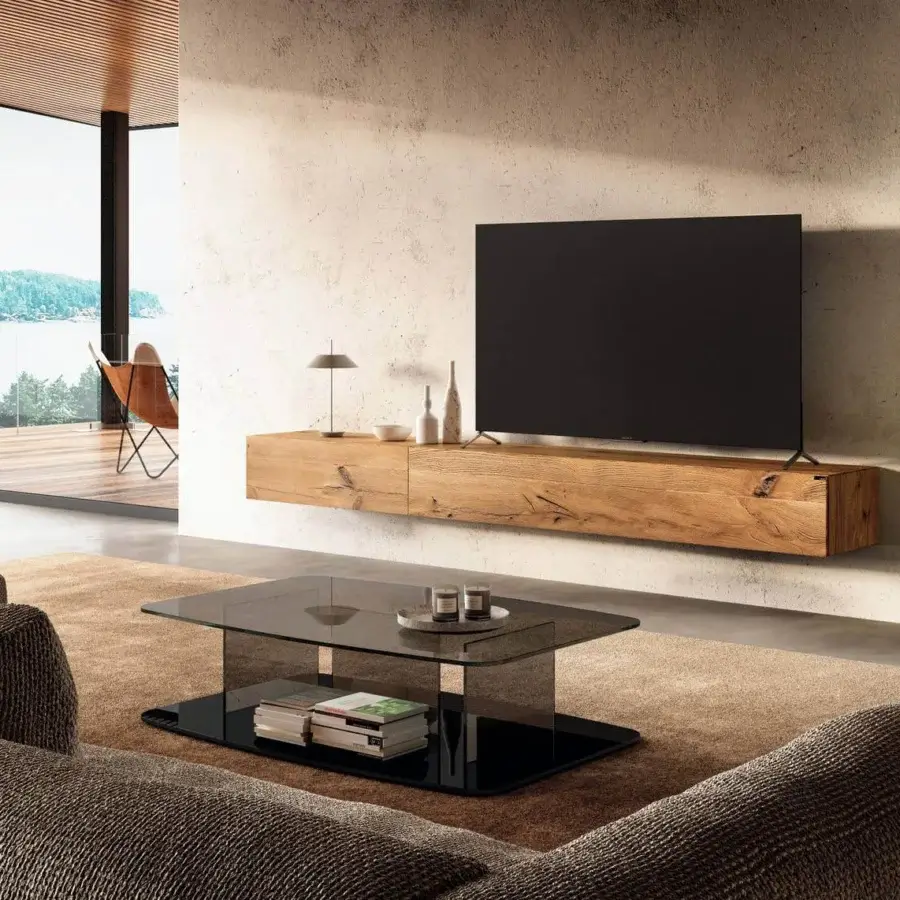 Captivating Lago Layers coffee table with smoked glass tiers and a solid black base creating a floating aesthetic