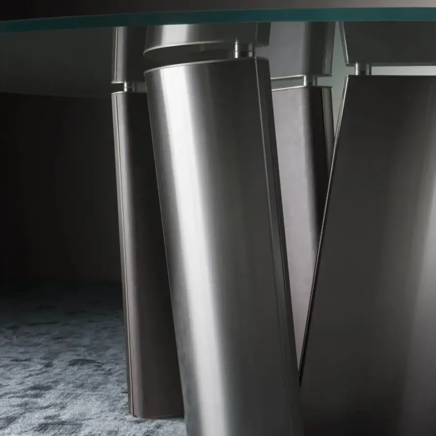 Distinguished OAK Madison table with dynamic form, abstract metal base and reflective glass top in matte gray finish