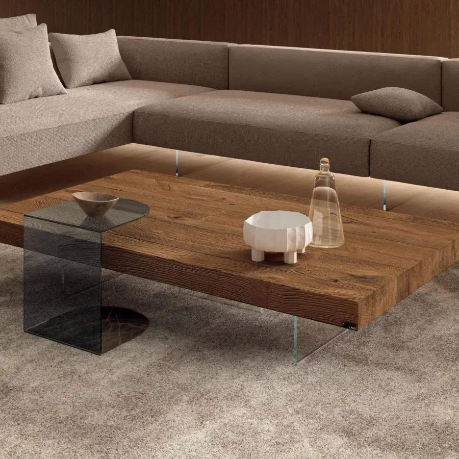 Distinguished Lago Tell side table with clear glass supports and textured XGlass in medium-brown tones