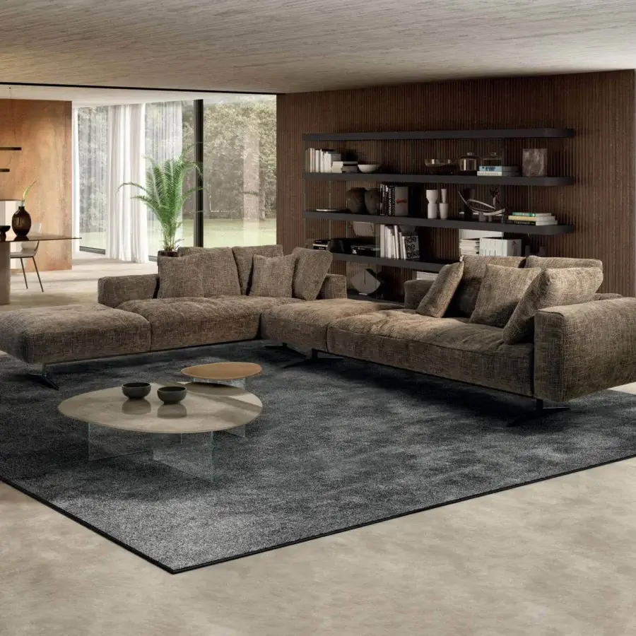 Distinguished Lago Pleasure coffee table with irregular curved forms in matte light brown and clear glass base