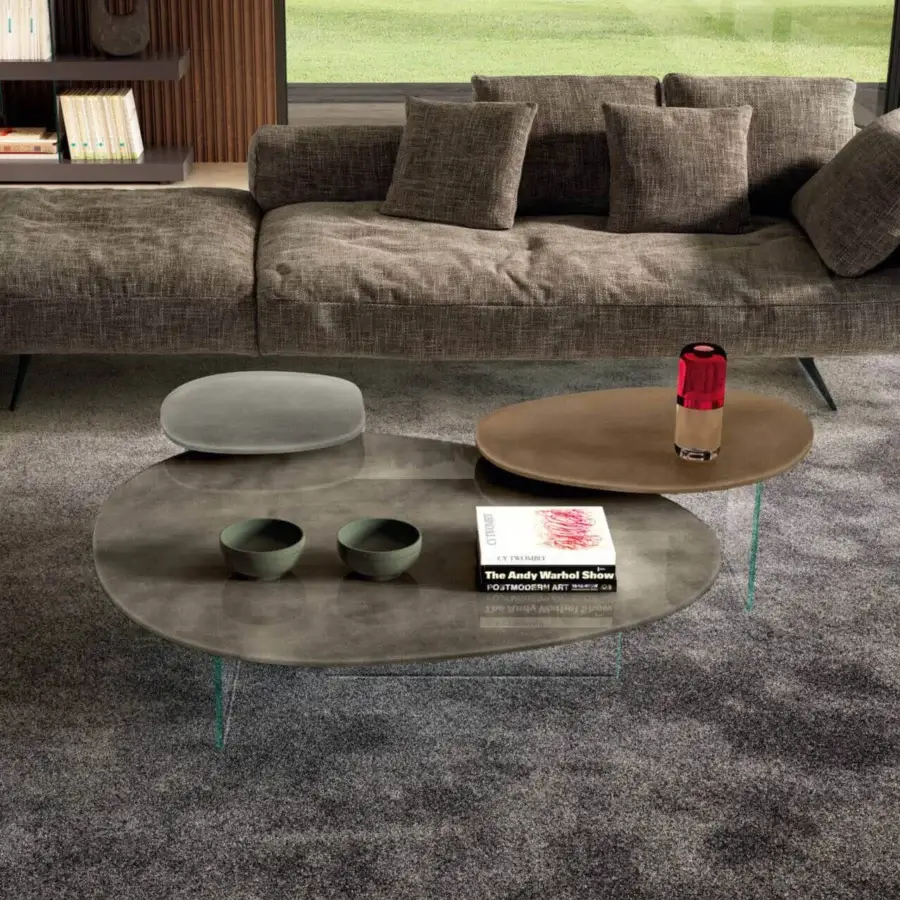 Elegant Lago Pleasure coffee table with irregular curved forms in muted grays and browns with matte and XGlass surfaces