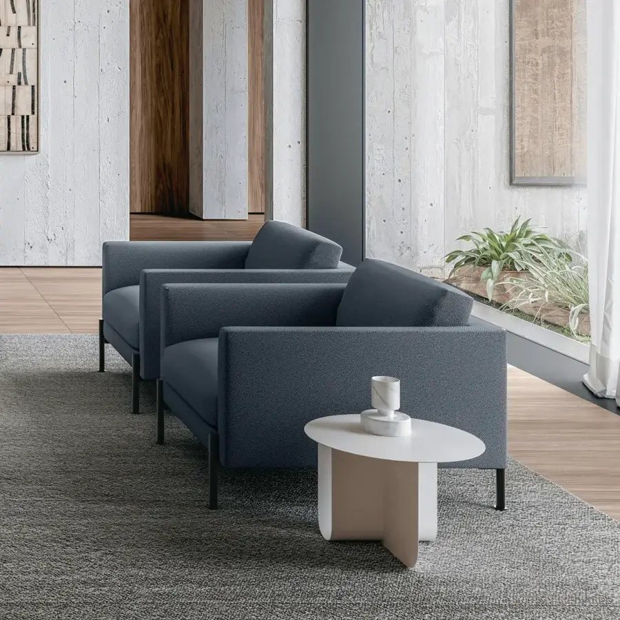 Elegant LaCividina Newtime lounge chair with dark blue textile upholstery and slim metal feet