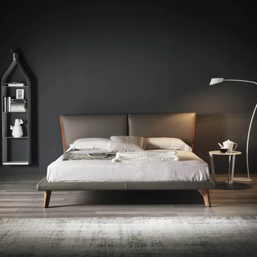 Distinguished Cattelan Italia Adam bed upholstered in gray fabric with red soft leather accents and Canaletto walnut feet with matte finish