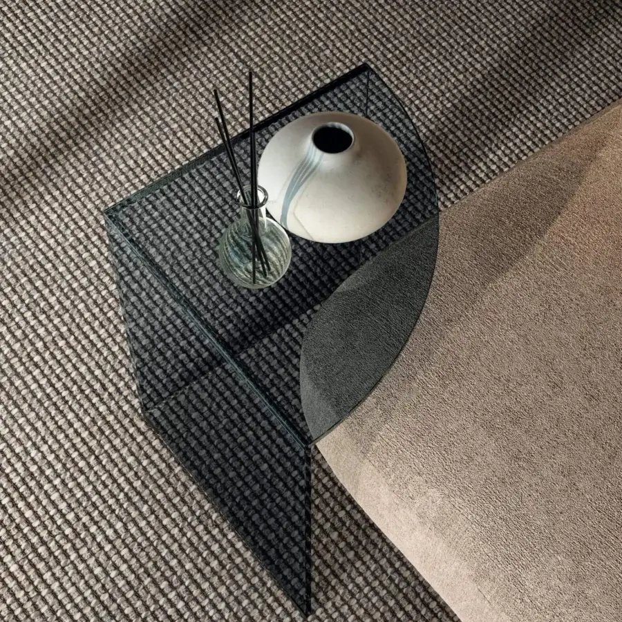 Distinguished Lago Snip side table with a quarter-circle tabletop and dark-tinted glass structure built in Italy with tempered-glass finish