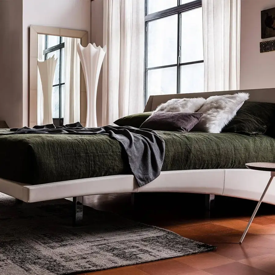 Captivating Cattelan Italia Dylan bed upholstered in light beige synthetic leather with a smooth matte finish and chromed steel feet