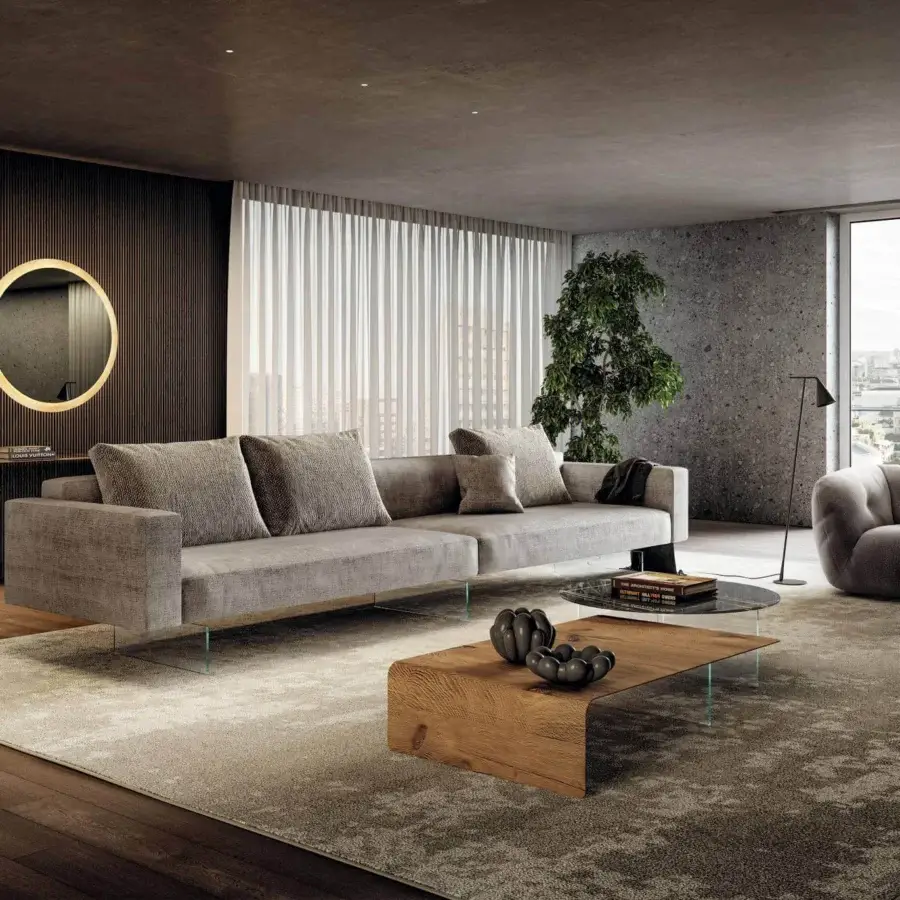 Elegant Lago Air sofa with a modular design upholstered in matte grey textile and clear tempered glass legs