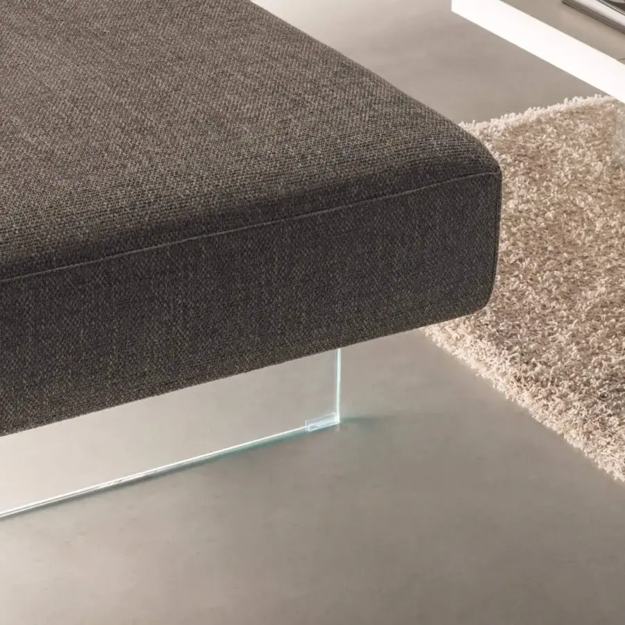 Distinguished Lago Air sofa with a modular build upholstered in matte dark gray woven textile and transparent tempered glass legs