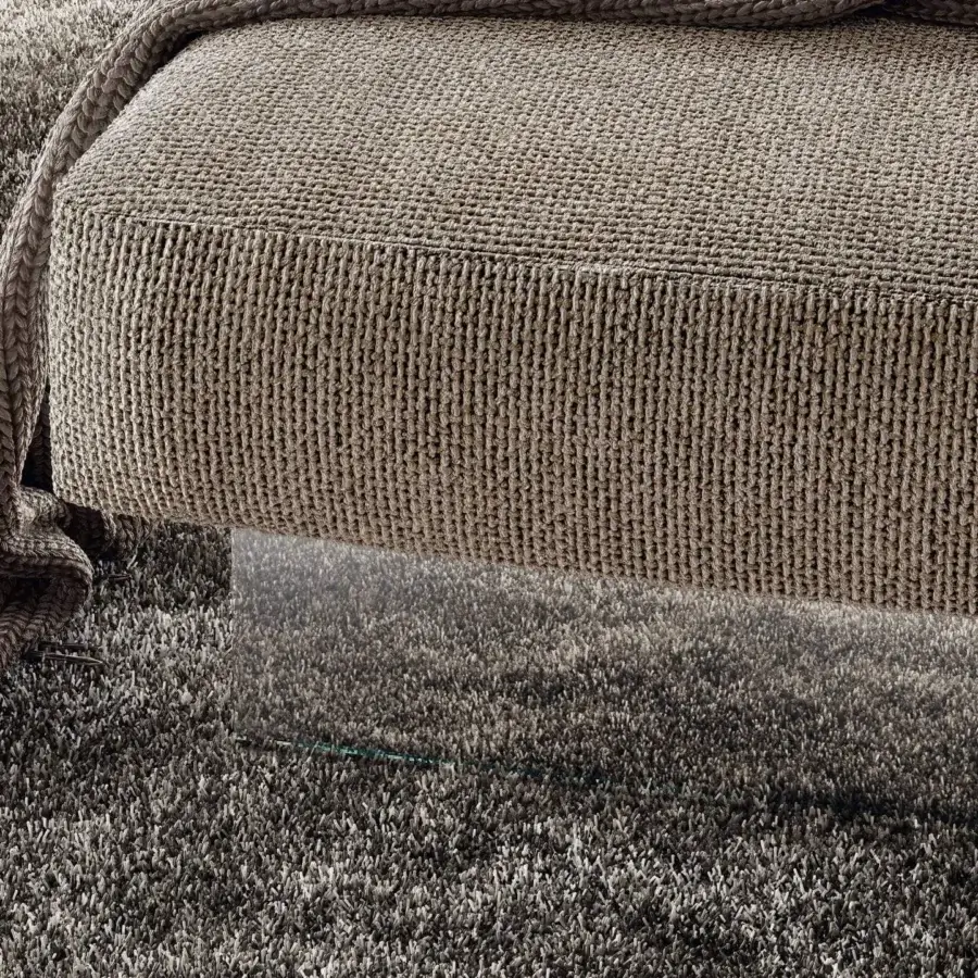 Elegant Lago Air sofa with modular design built upon transparent tempered glass and woven taupe textile upholstery