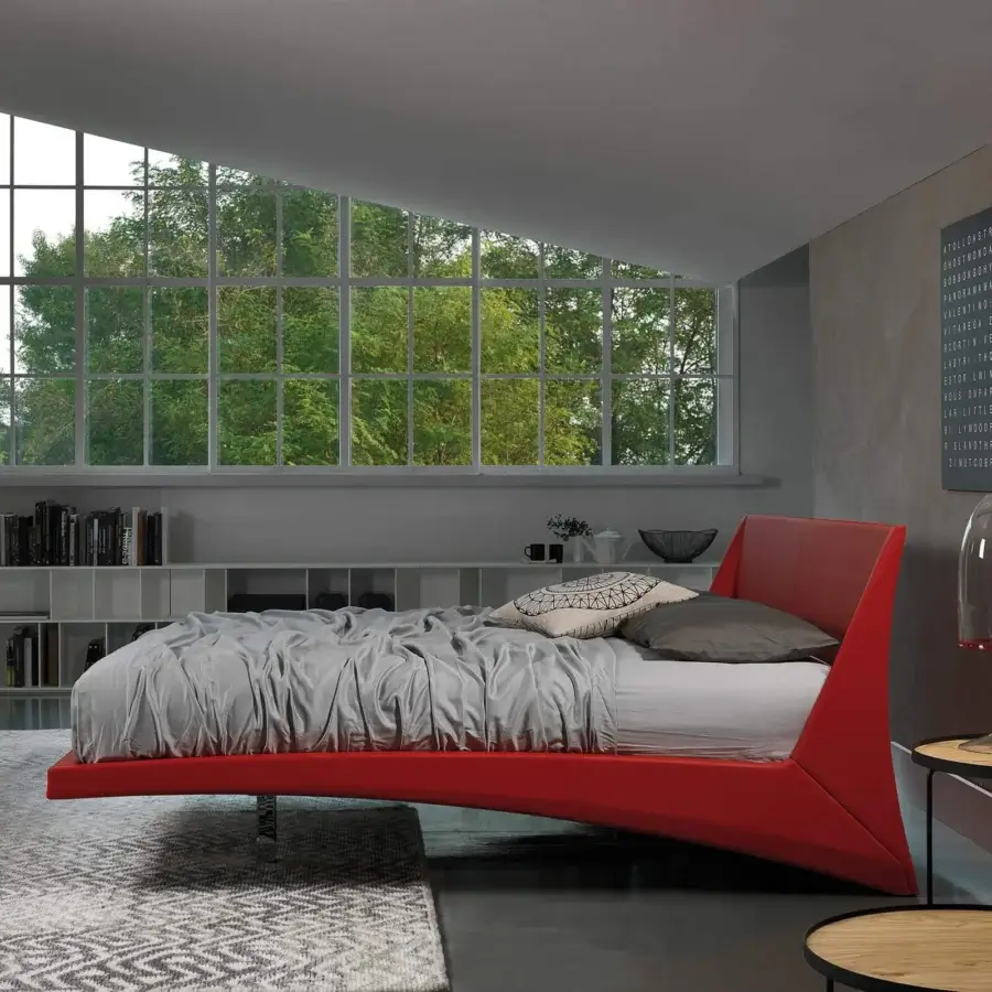 Distinguished Cattelan Italia Dylan bed upholstered in red fabric with a curved silhouette and chromed steel feet