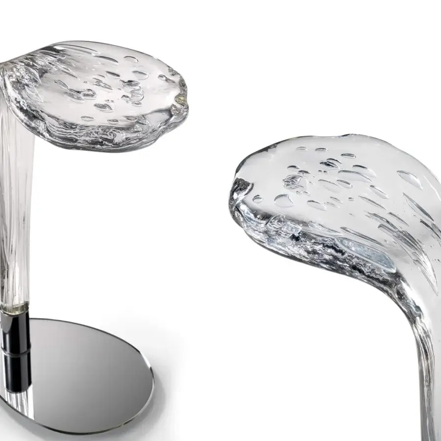 Distinguished Reflex Loto table crafted in Italy with transparent Murano glass, shiny steel, and reflective chrome-toned mirror glass