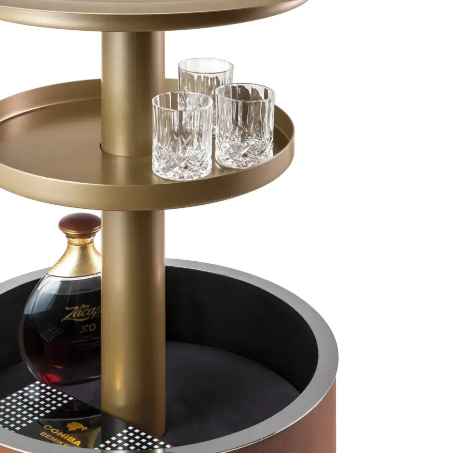 Exceptional Reflex Coconut bar cabinet with cylindrical design in golden brass and brown leather exterior