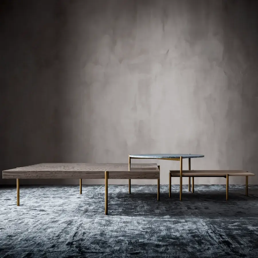 Distinguished OAK Ritmo coffee table with rectangular wood top and slender gold-colored painted metal legs in textured matte finish