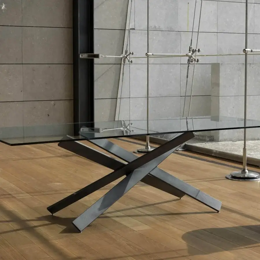 Exceptional Reflex Mikado table with transparent glass top and dark matte finish iron intersecting beams
