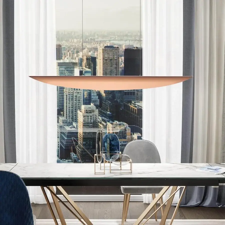 Elegant Reflex Ala suspension lamp with curved steel internally lacquered in latte color and warm copper finish