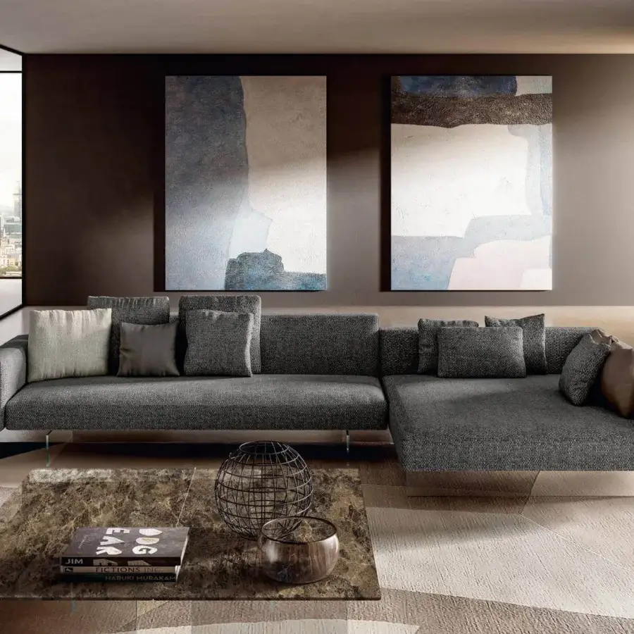 Distinguished Lago Air sectional with textured matte gray textile, wide flat arms and geometric construction revealing a metallic base