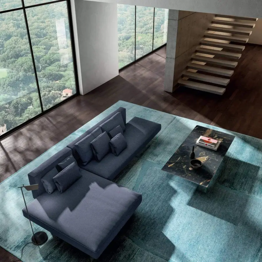 Exceptional Lago Air sectional with deep blue textile and extra-clear tempered glass legs, built with a matte finish