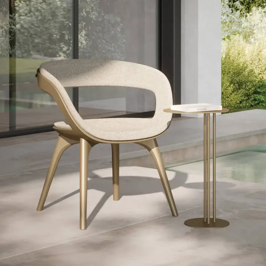 Exceptional Reflex Nido armchair with bronze metallic shell and legs, upholstered in light beige textile
