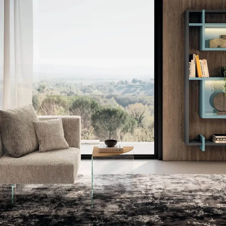 Distinguished Lago Air lounge chair with light brown textile upholstery and textured matte finish, supported by tempered glass legs with a feather cushion