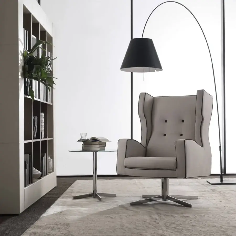 Elegant 4 Mariani Cassandra lounge chair with light gray textile upholstery, darker trim and matte metal swivel base