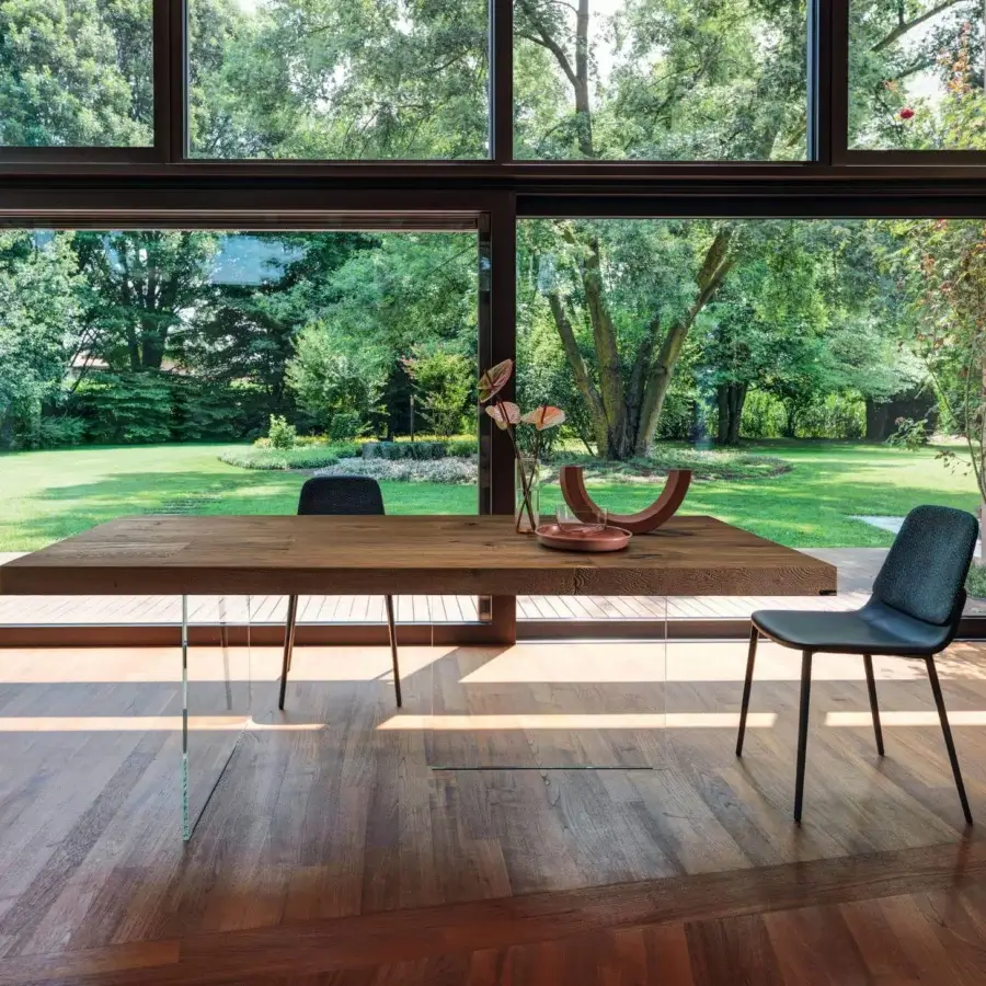 Distinguished Lago Air table crafted in Wildwood oak with clear tempered-glass supports and smooth matte finish