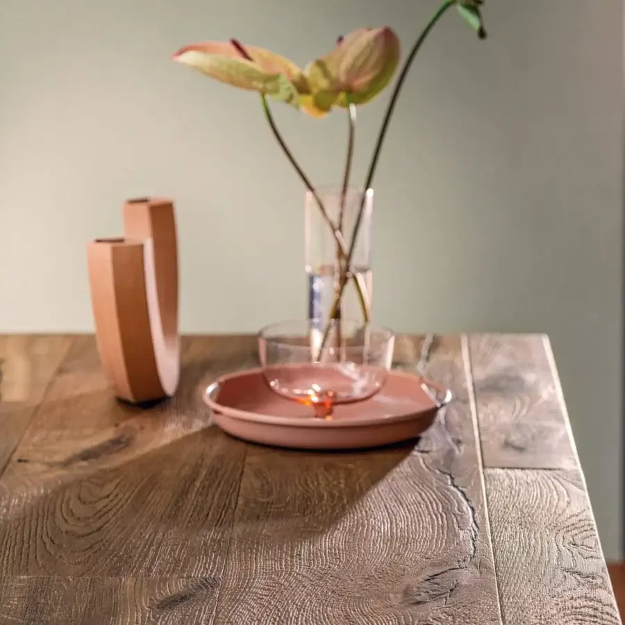 Superior Lago Air table crafted in Wildwood oak with textured rustic finish and near-invisible tempered-glass legs