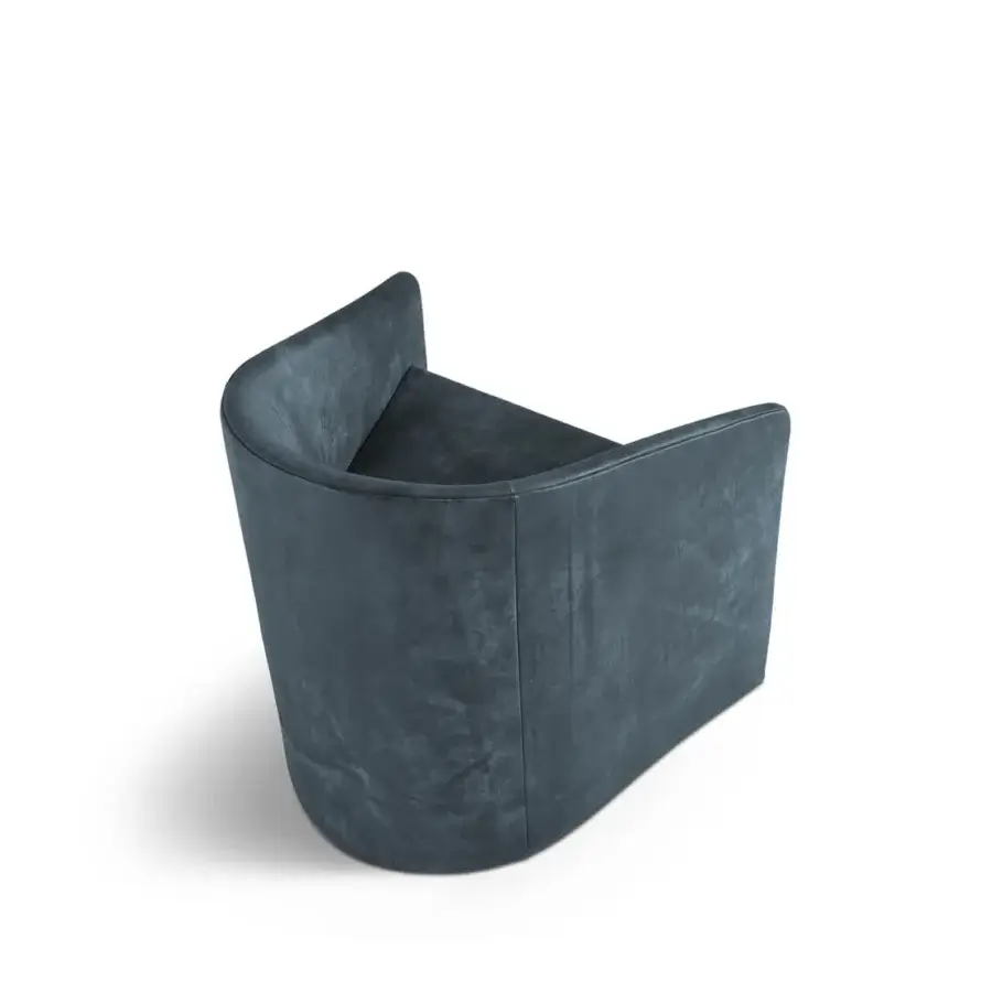 Distinguished 4 Mariani Manta lounge chair crafted in muted blue-gray textile with a matte finish and enveloping curved form