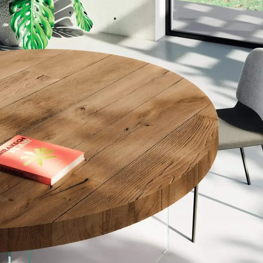 Distinguished Lago Air round table with textured warm brown Wildwood oak tabletop and nearly invisible tempered-glass legs
