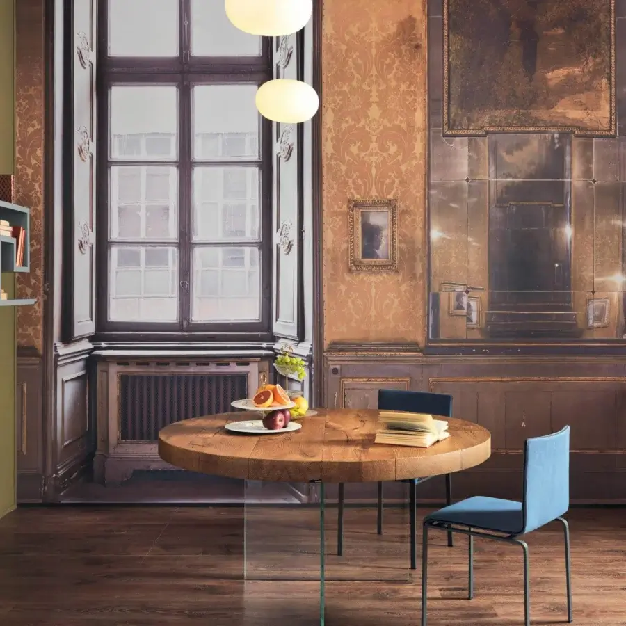 Superior Lago Air round table with warm medium-brown Wildwood oak tabletop and transparent tempered-glass supports in a natural matte finish