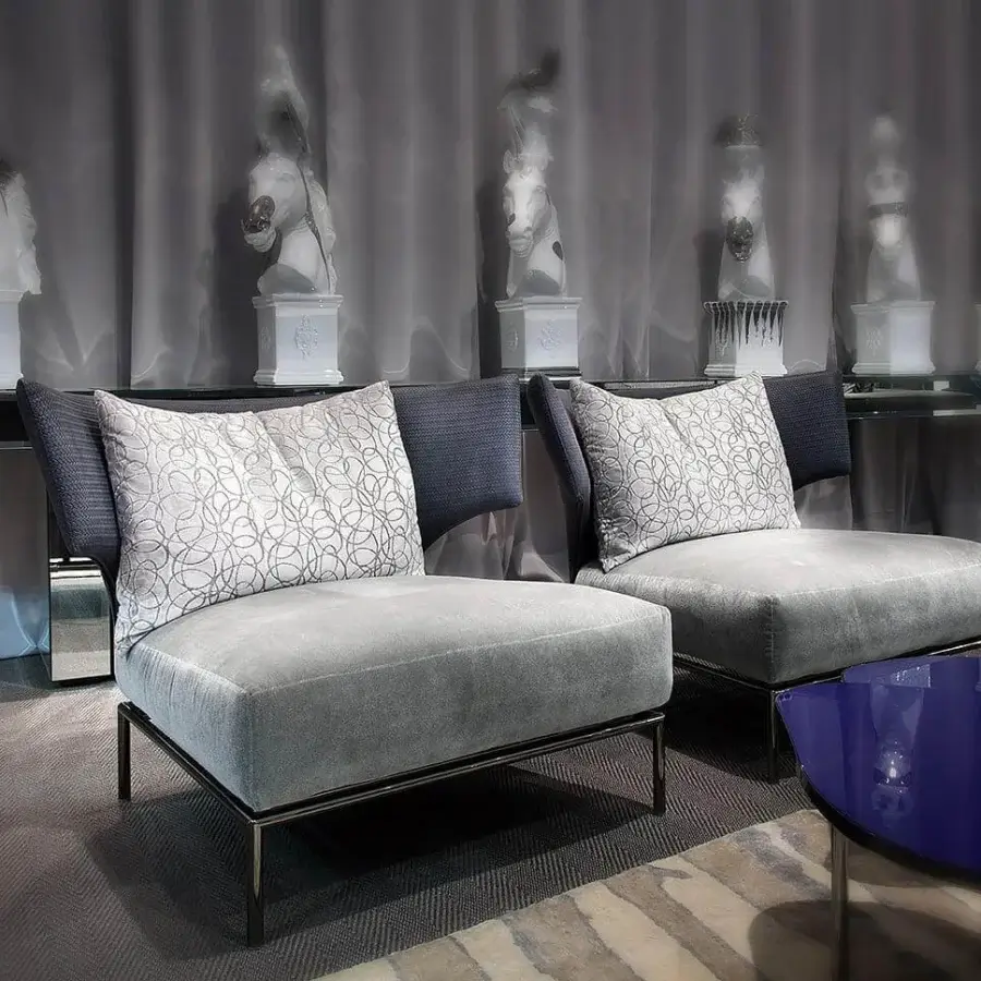 Distinguished Erba Abbraccio lounge chair with matte gray textile upholstery and bright chrome metal base