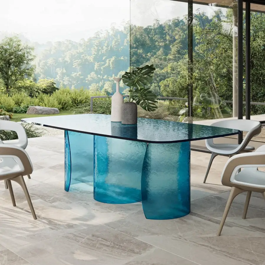 Elegant Reflex Petalo Acqua table with curved bases and textured Acqua glass top crafted in Italy