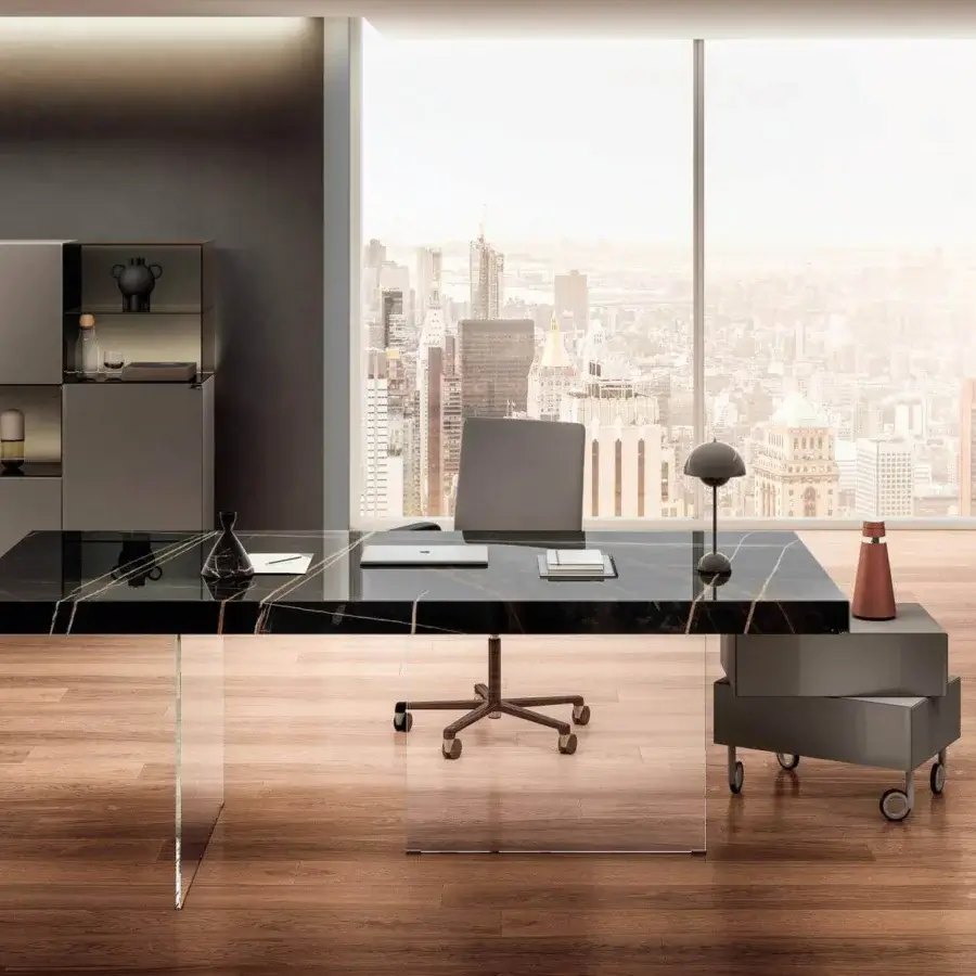 Exceptional Lago Air table with monolithic black glass top exhibiting light veining and clear tempered-glass supports