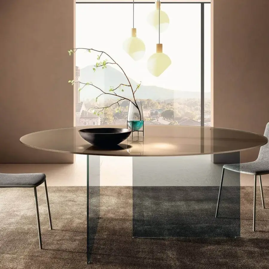 Refined Lago Air Slim round table with polished bronze-toned glass top and transparent ultra-strong legs crafted from heat-treated tempered glass