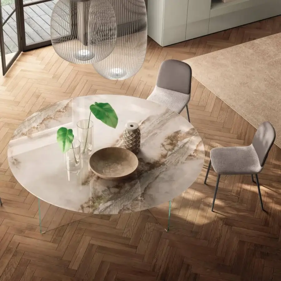 Superior Lago Air Slim round table with marble-patterned glass top and slender transparent legs crafted in Italy