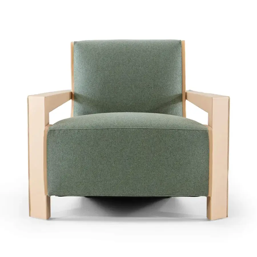 Exceptional Swan Italia Chelsea lounge chair with green textile upholstery and beige coach hide armrests built in Italy