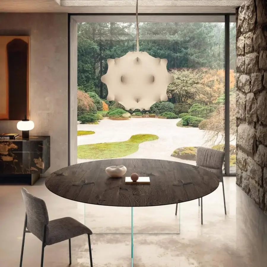 Captivating Lago Air Slim round table with dark brown wood exhibiting natural grain and transparent tempered-glass base crafted in Italy